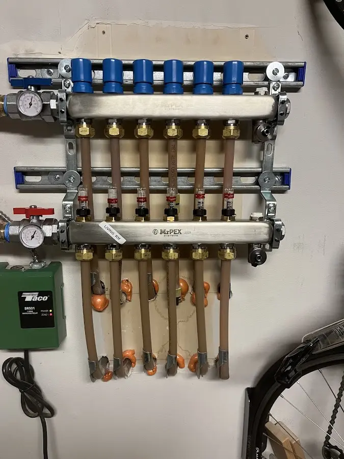 Plumber performing Water Heater Repair at a residential property in Lawton